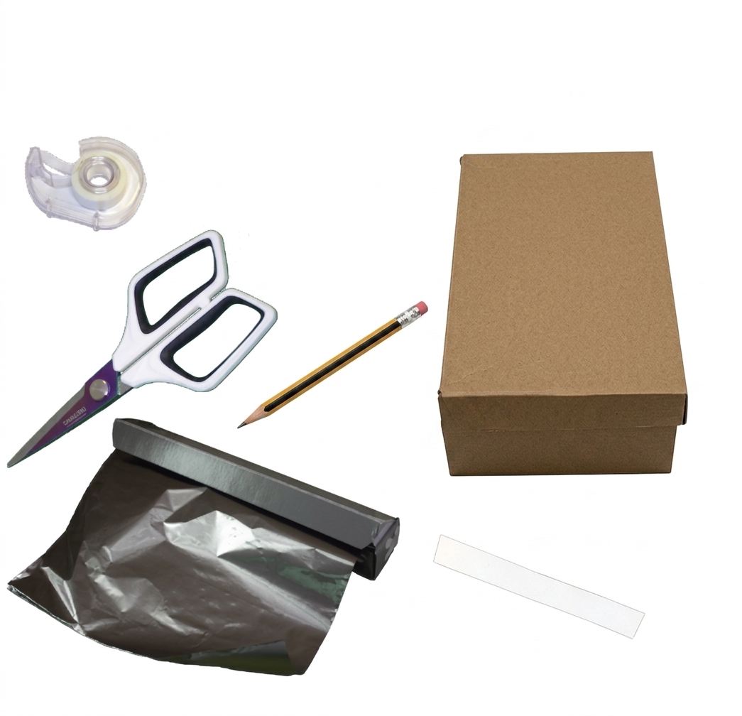 Materiales para hacer una cámara oscura con una caja de zapatos